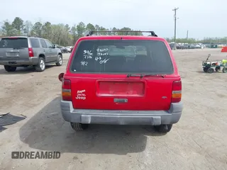 1996 Jeep Grand Cherokee Laredo with VIN 1J4FX58S4TC346218, listed as a IAAI auction lot 41943268 with 138,431 mi miles and . Bid and sale history available at DreamBid. Image 16.