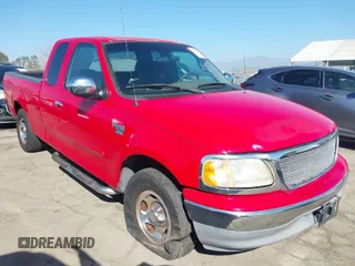 2002 Ford F-150 XL with VIN 1FTRX17W52NA81828, listed as a IAAI auction lot 41450811 with 201,948 mi miles. Bid and sale history available at carsss.com. Image 1.
