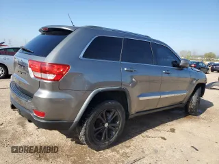 2011 Jeep Grand Cherokee Laredo with VIN 1J4RR4GGXBC642759, listed as a Copart auction lot 55767575 with 144,104 mi miles and Salvage title. Bid and sale history available at DreamBid. Image 3.