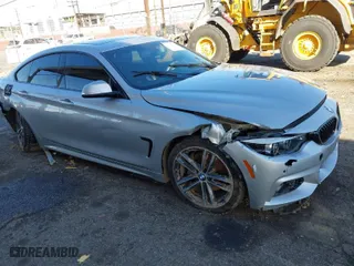 2019 BMW 4 Series 430i with VIN WBA4J1C59KBM18458, listed as a IAAI auction lot 41616102 with 51,878 mi miles. Bid and sale history available at carsss.com. Image 1.