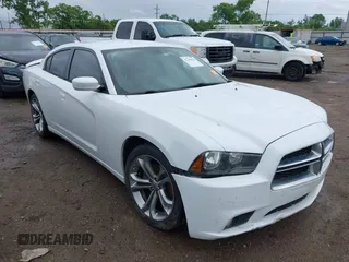 2014 Dodge Charger SXT z VIN 2C3CDXHGXEH207546, wystawiony jako IAAI lot #42204631 z przebiegiem 160 240 mil mil oraz . Historia ofert i sprzedaży dostępna na DreamBid. Obrazek 1.