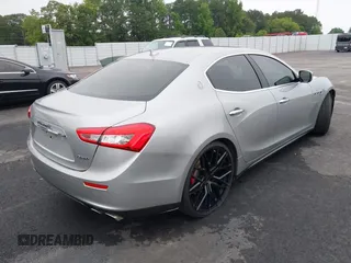 2015 Maserati Ghibli S Q4 with VIN ZAM57RTA2F1146411, listed as a IAAI auction lot 42359547 with 95,937 mi miles and . Bid and sale history available at DreamBid. Image 4.