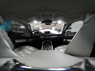 2020 Mazda CX-5 Grand Touring with VIN JM3KFBDM6L1828611, listed as a IAAI auction lot 42006976 with 59,939 mi miles and . Bid and sale history available at DreamBid. Image 19.
