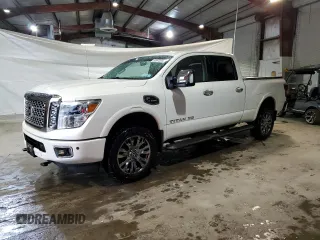 2017 Nissan Titan Pro-4X z VIN 1N6BA1F46HN574314, wystawiony jako Copart lot #55573985 z przebiegiem 98 812 mil mil oraz Szkoda całkowita • Salvage title. Historia ofert i sprzedaży dostępna na DreamBid. Obrazek 1.