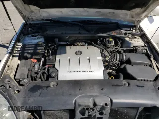 2005 Cadillac DeVille z VIN 1G6KD54Y65U100231, wystawiony jako Copart lot #55758605 z przebiegiem 166 871 mil mil oraz Szkoda całkowita • Salvage title. Historia ofert i sprzedaży dostępna na DreamBid. Obrazek 11.