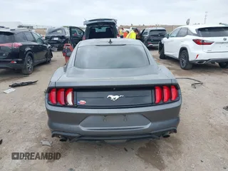 2021 Ford Mustang EcoBoost with VIN 1FA6P8TH1M5152941, listed as a IAAI auction lot 42110646 with 26,673 mi miles and . Bid and sale history available at DreamBid. Image 16.