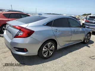 2017 Honda Civic EX-L z VIN 19XFC1F7XHE207946, wystawiony jako Copart lot #58730425 z przebiegiem 58 564 mil mil oraz Szkoda całkowita • Salvage title. Historia ofert i sprzedaży dostępna na DreamBid. Obrazek 3.