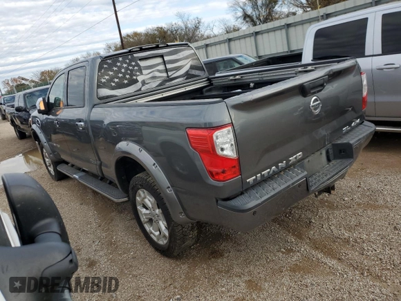 2016 Nissan Titan XD PRO-4X with VIN 1N6BA1F4XGN517824, listed as a Copart auction lot 83119324 with 150,310 mi miles and Clean Title. Bid and sale history available at carsss.com. Image 2.