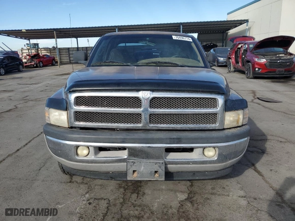 2000 Dodge Ram 1500 with VIN 3B7HC13Z8YM241128, listed as a Copart auction lot 76496774 with 125,929 mi miles and Salvage Title. Bid and sale history available at carsss.com. Image 5.