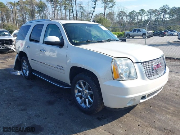 2012 GMC Yukon Denali with VIN 1GKS1EEF5CR156426, listed as a IAAI auction lot 41673781 with 147,022 mi miles. Bid and sale history available at carsss.com. Image 1.