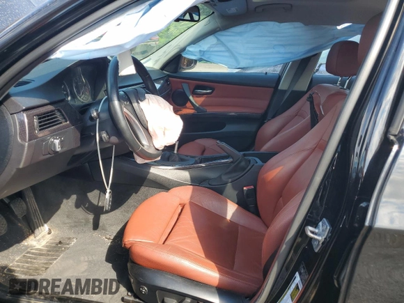 2011 BMW 3 Series 335i xDrive with VIN WBAPL5C53BA742753, listed as a Copart auction lot 61596655 with Not provided miles and Salvage title. Bid and sale history available at DreamBid. Image 7.