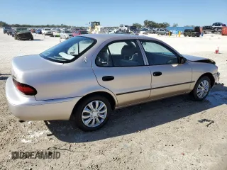 1996 Geo Prizm z VIN 1Y1SK5267TZ068437, wystawiony jako Copart lot #41403285 z przebiegiem 74 727 mil mil oraz Szkody całkowita. Historia ofert i sprzedaży dostępna na DreamBid. Obrazek 3.