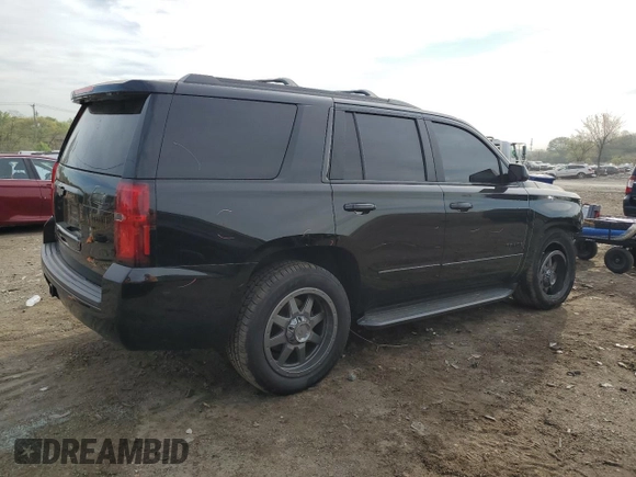 2018 Chevrolet Tahoe LS z VIN 1GNSKAKC8JR215839, wystawiony jako Copart lot #52627955 z przebiegiem 96 380 mil mil oraz Szkoda całkowita • Salvage title. Historia ofert i sprzedaży dostępna na DreamBid. Obrazek 3.