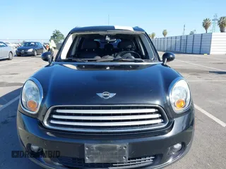 2013 MINI Countryman z VIN WMWZB3C52DWM07621, wystawiony jako IAAI lot #42085389 z przebiegiem 153 714 mil mil oraz . Historia ofert i sprzedaży dostępna na DreamBid. Obrazek 12.