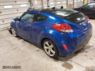 2014 Hyundai Veloster with VIN KMHTC6AD4EU196870, listed as a IAAI auction lot 41207663 with 119,252 mi miles. Bid and sale history available at carsss.com. Image 3.