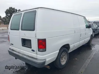 2004 Ford Econoline Cargo with VIN 1FTRE14W44HA43969, listed as a IAAI auction lot 41488289 with 268,097 mi miles. Bid and sale history available at carsss.com. Image 4.