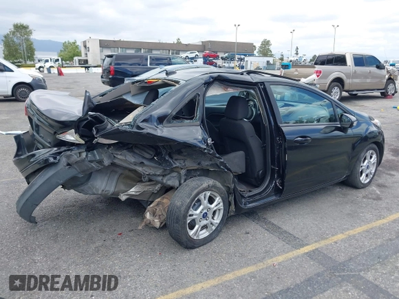 2014 Ford Fiesta SE z VIN 3FADP4BJ0EM216922, wystawiony jako IAAI lot #42255776 z przebiegiem 87 371 mil mil oraz . Historia ofert i sprzedaży dostępna na DreamBid. Obrazek 4.