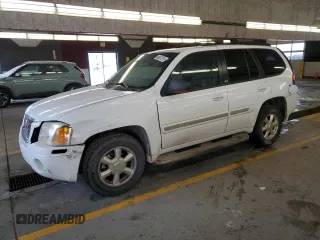2002 GMC Envoy SLT with VIN 1GKDT13S622231265, listed as a Copart auction lot 45037215 with 213,069 mi miles and Salvage Title. Bid and sale history available at carsss.com. Image 1.