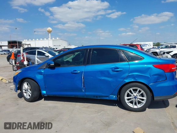 2015 Ford Focus SE with VIN 1FADP3F21FL379837, listed as a IAAI auction lot 42021623 with 146,571 mi miles. Bid and sale history available at carsss.com. Image 14.