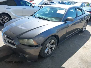 2013 Dodge Charger SE with VIN 2C3CDXBGXDH688230, listed as a IAAI auction lot 41634325 with 133,519 mi miles. Bid and sale history available at carsss.com. Image 17.