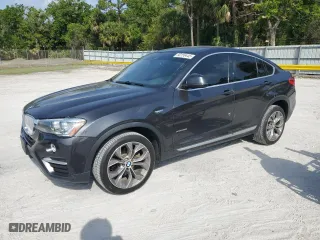 2017 BMW X4 xDrive28i with VIN 5UXXW3C36H0T79956, listed as a Copart auction lot 50156445 with 100,226 mi miles and Salvage Title. Bid and sale history available at carsss.com. Image 1.
