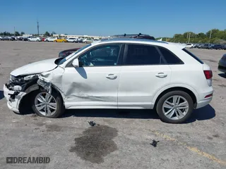 2017 Audi Q3 Premium with VIN WA1BCCFSXHR016914, listed as a IAAI auction lot 41784539 with 94,862 mi miles. Bid and sale history available at carsss.com. Image 14.