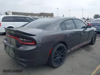 2019 Dodge Charger SXT with VIN 2C3CDXBG2KH643442, listed as a IAAI auction lot 41896681 with 104,061 mi miles. Bid and sale history available at carsss.com. Image 4.