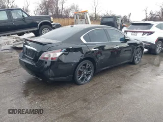 2014 Nissan Maxima SV with VIN 1N4AA5AP6EC437992, listed as a IAAI auction lot 41856233 with 69,059 mi miles and . Bid and sale history available at DreamBid. Image 4.