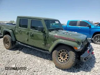 2023 Jeep Gladiator Rubicon с VIN 1C6JJTBM8PL515539, выставлен на аукционе Copart как лот 61076725 с пробегом 21 434 миль миль и Списание • Salvage title. История ставок и продаж доступна на DreamBid. Изображение 14.