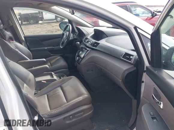 2014 Honda Odyssey EX-L with VIN 5FNRL5H63EB136541, listed as a IAAI auction lot 41866320 with 148,696 mi miles and . Bid and sale history available at DreamBid. Image 5.