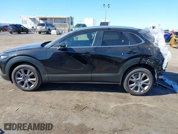 2024 Mazda CX-30 S Carbon Edition with VIN 3MVDMBCM4RM607530, listed as a IAAI auction lot 41796426 with 3,715 mi miles and . Bid and sale history available at DreamBid. Image 14.