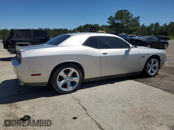 2012 Dodge Challenger R/T z VIN 2C3CDYBT0CH259731, wystawiony jako Copart lot #58033035 z przebiegiem 142 427 mil mil oraz Czysty tytuł • Clean title. Historia ofert i sprzedaży dostępna na DreamBid. Obrazek 3.