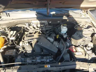 2008 Mercury Mariner with VIN 4M2CU81178KJ06737, listed as a IAAI auction lot 41638001 with 143,895 mi miles. Bid and sale history available at carsss.com. Image 10.
