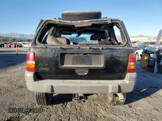 1998 Jeep Grand Cherokee Laredo with VIN 1J4FX58S4WC102623, listed as a Copart auction lot 86188764 with 283,210 mi miles and Salvage Title. Bid and sale history available at carsss.com. Image 6.