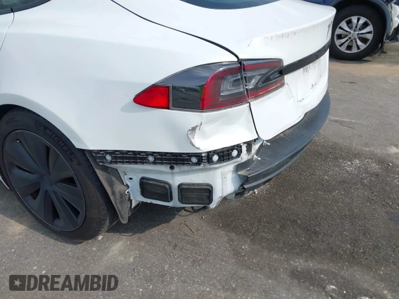 2022 Tesla Model S with VIN 5YJSA1E57NF462175, listed as a IAAI auction lot 42231439 with Not provided miles and . Bid and sale history available at DreamBid. Image 6.