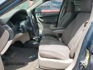 2005 Chrysler Pacifica z VIN 2C8GM48L75R453259, wystawiony jako Copart lot #57234075 z przebiegiem 158 034 mil mil oraz Szkoda całkowita • Salvage title. Historia ofert i sprzedaży dostępna na DreamBid. Obrazek 7.
