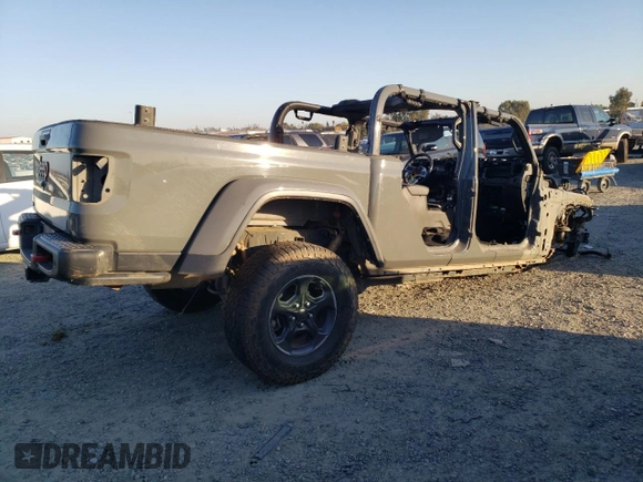 2021 Jeep Gladiator Rubicon z VIN 1C6JJTBMXML503128, wystawiony jako Copart lot #42813725 z przebiegiem Nie podano mil oraz Szkoda całkowita • Salvage title. Historia ofert i sprzedaży dostępna na DreamBid. Obrazek 3.