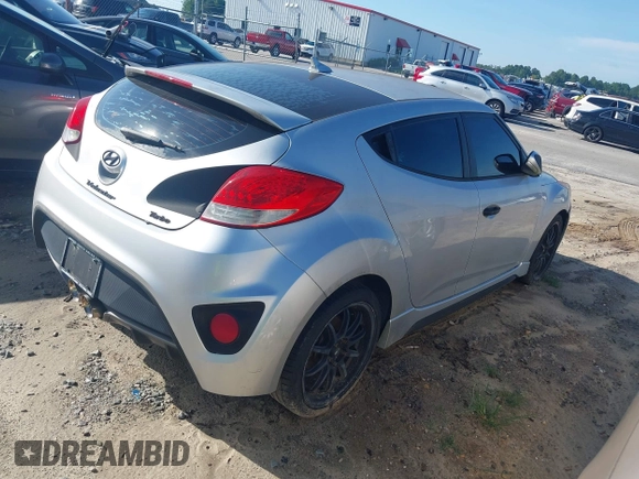 2013 Hyundai Veloster Turbo with VIN KMHTC6AE5DU112756, listed as a IAAI auction lot 42854505 with 99,015 mi miles and . Bid and sale history available at DreamBid. Image 4.