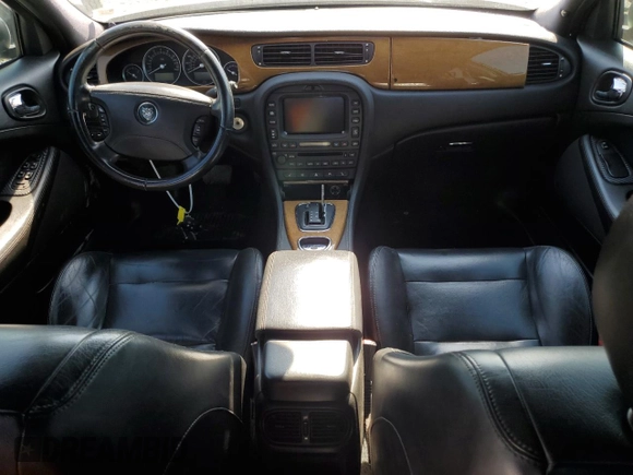 2005 Jaguar S-Type with VIN SAJWA03V251N28012, listed as a Copart auction lot 74417644 with 128,947 mi miles and Salvage Title. Bid and sale history available at DreamBid. Image 8.