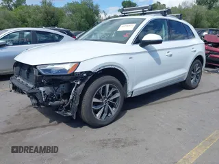 2022 Audi Q5 S line Premium Plus with VIN WA1EAAFY0N2021054, listed as a IAAI auction lot 42296927 with 27,310 mi miles and . Bid and sale history available at DreamBid. Image 2.