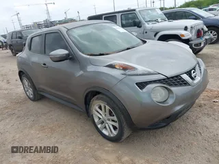 2015 Nissan Juke S with VIN JN8AF5MR8FT512769, listed as a IAAI auction lot 42102306 with 74,952 mi miles. Bid and sale history available at carsss.com. Image 1.