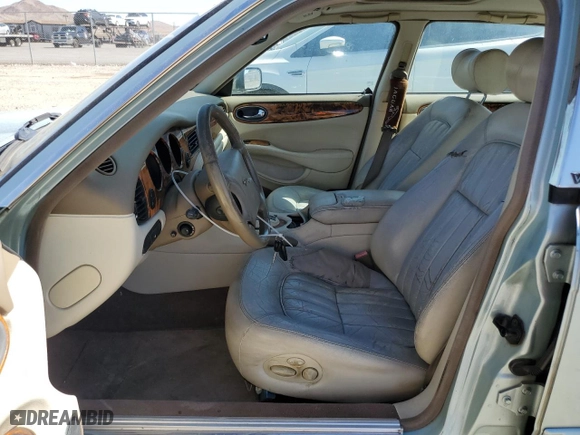 2000 Jaguar XJ with VIN SAJDA14C1YLF10459, listed as a Copart auction lot 65583394 with 113,333 mi miles and Salvage Title. Bid and sale history available at carsss.com. Image 7.