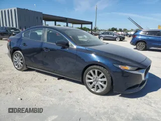 2023 Mazda 3 S Preferred with VIN 3MZBPACMXPM374998, listed as a Copart auction lot 50131565 with 6,303 mi miles and Salvage Title. Bid and sale history available at DreamBid. Image 4.