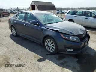 2015 Kia Optima LX z VIN 5XXGM4A7XFG451577, wystawiony jako IAAI lot #41771277 z przebiegiem 60 103 mil mil oraz . Historia ofert i sprzedaży dostępna na DreamBid. Obrazek 1.