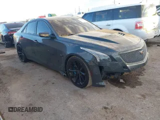 2016 Cadillac CTS-V z VIN 1G6A15S6XG0116027, wystawiony jako IAAI lot #41358028 z przebiegiem 81 421 mil mil oraz . Historia ofert i sprzedaży dostępna na DreamBid. Obrazek 1.