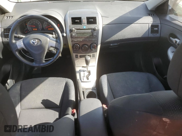 2010 Toyota Corolla with VIN 1NXBU4EEXAZ212290, listed as a Copart auction lot 54184055 with 284,234 mi miles and Salvage Title. Bid and sale history available at DreamBid. Image 8.