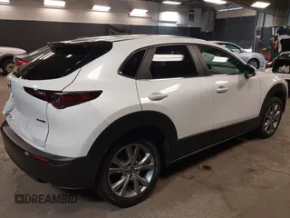 2021 Mazda CX-30 Preferred z VIN 3MVDMBCL2MM210902, wystawiony jako IAAI lot #42522203 z przebiegiem 42 995 mil mil oraz . Historia ofert i sprzedaży dostępna na DreamBid. Obrazek 4.