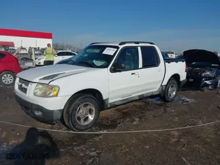 2004 Ford Explorer Sport Trac XLS with VIN 1FMZU67K04UC22800, listed as a IAAI auction lot 41869208 with 157,711 mi miles. Bid and sale history available at carsss.com. Image 2.