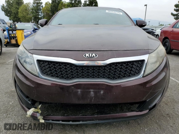 2013 Kia Optima LX z VIN 5XXGM4A74DG102024, wystawiony jako Copart lot #58264275 z przebiegiem 128 594 mil mil oraz Szkoda całkowita • Salvage title. Historia ofert i sprzedaży dostępna na DreamBid. Obrazek 5.