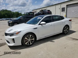 2016 Kia Optima SXL Turbo with VIN 5XXGV4L21GG015880, listed as a Copart auction lot 56623315 with 134,632 mi miles and Salvage title. Bid and sale history available at DreamBid. Image 1.